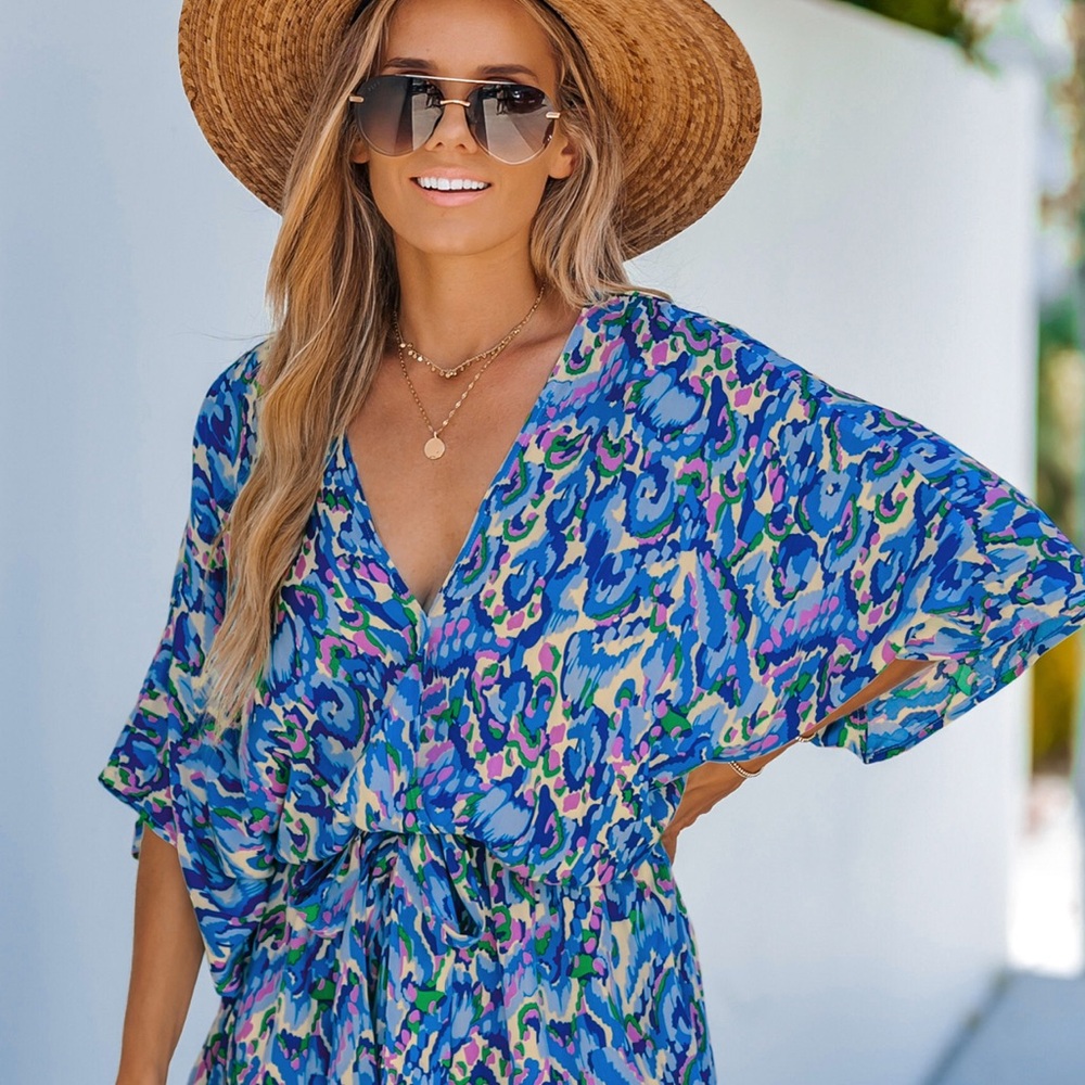 Size medium new with tags blue printed romper short sleeved